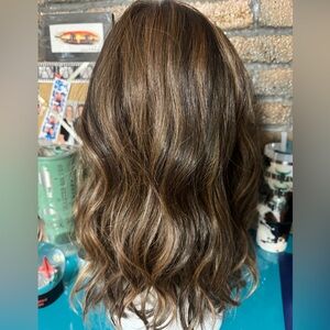 Brand new synthetic lace wig. Only tried on. Never worn